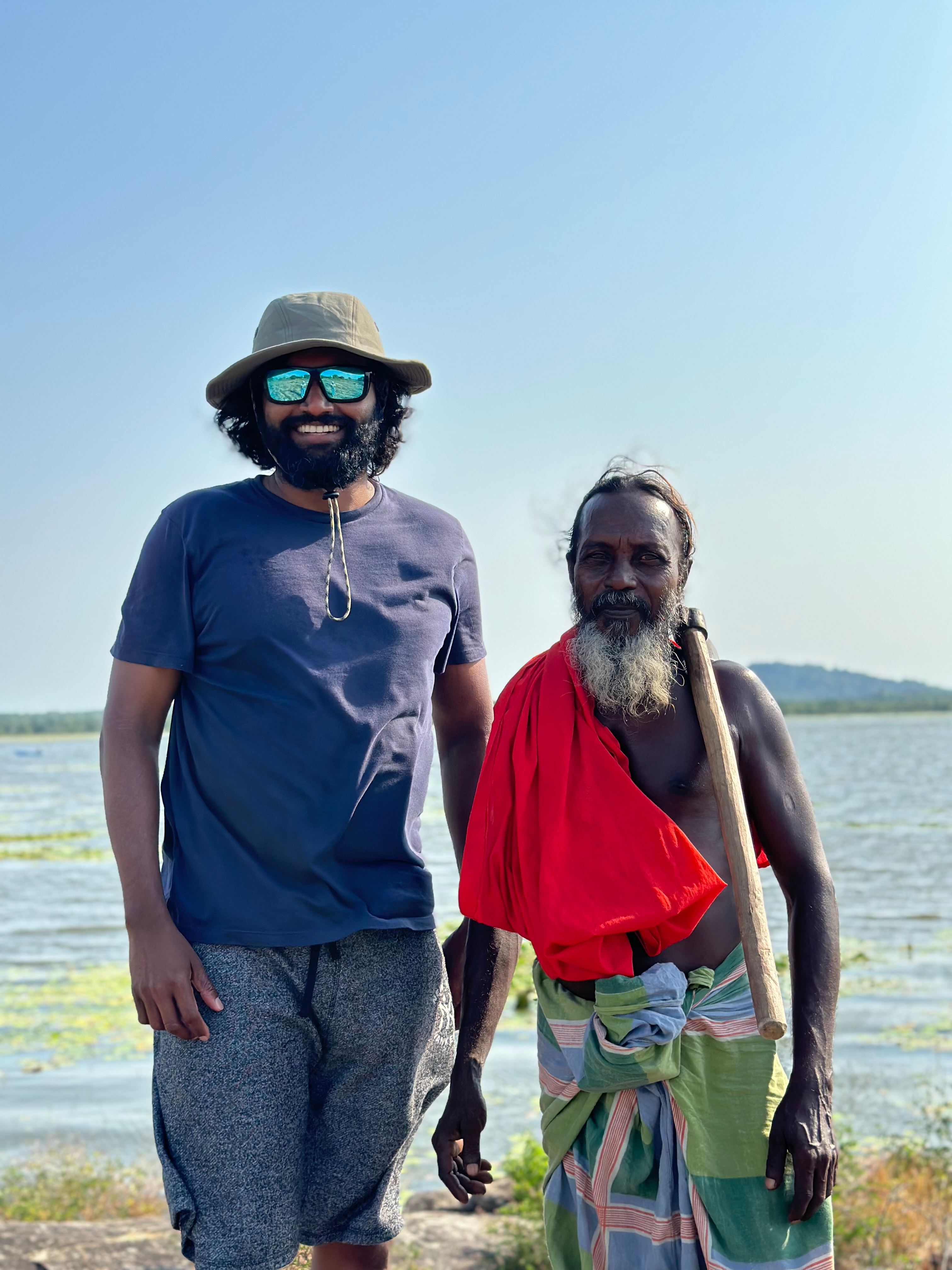Eranga Galappaththi (at left) with a study participant while conducting field research in Sri Lanka, summer 2023. Photo courtesy of Eranga Galappaththi.